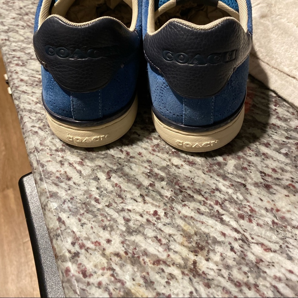 A nice pair of blue suede AuthenticCoach shoes